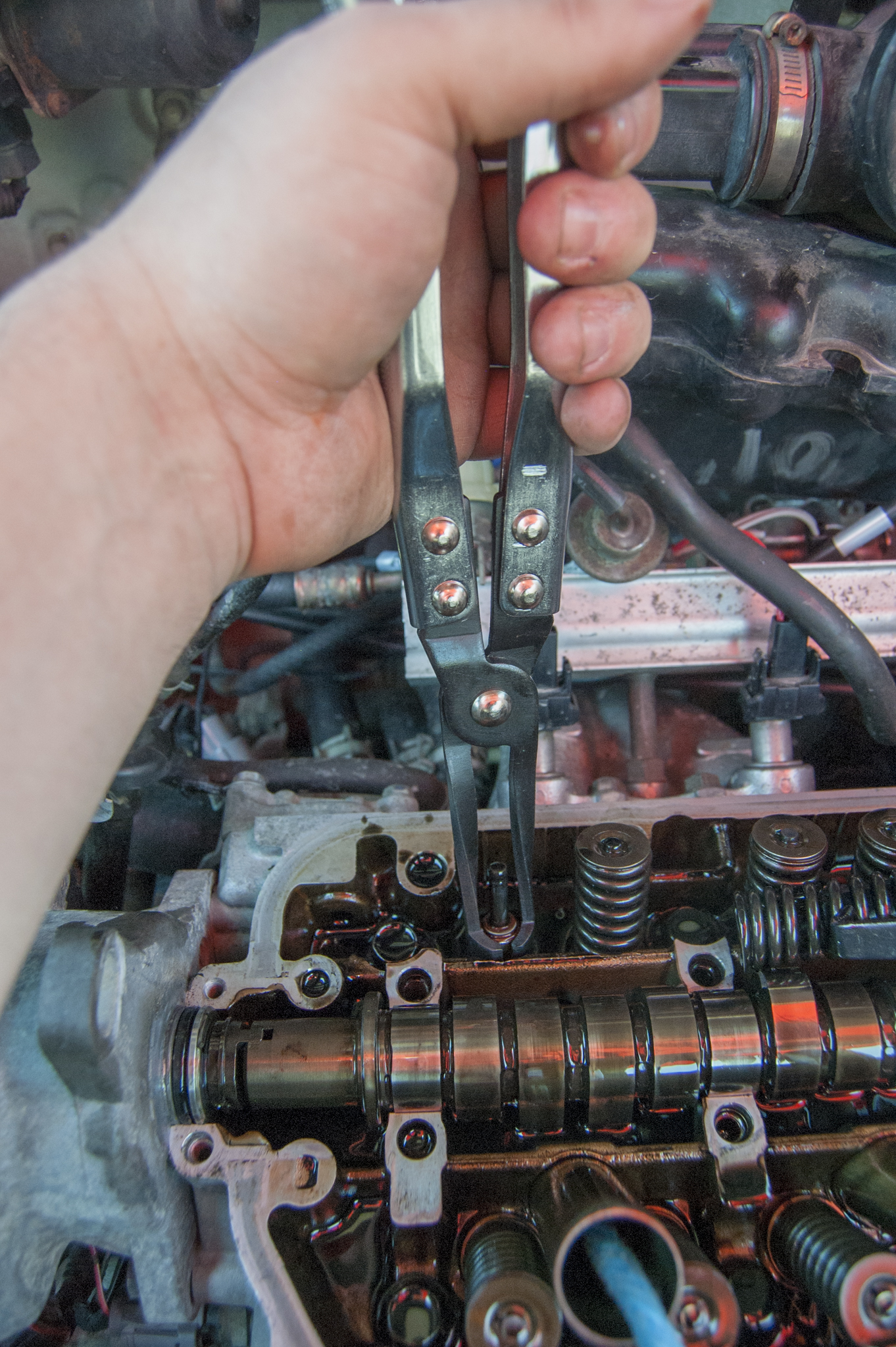 Queue de soupape avec ressort